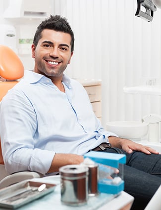 Patient sitting in a dental chair